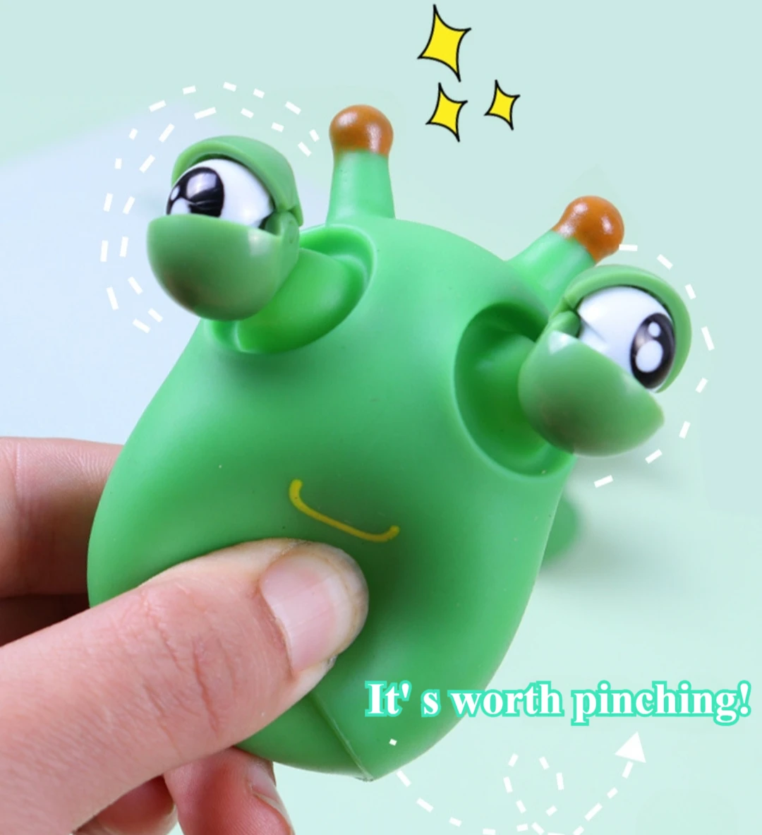 Grüner Wurm-Quetschspielzeug mit Augen 3