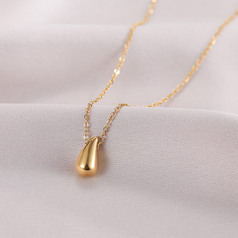 Goldfarbene Tropfen-Choker-Halskette aus Edelstahl 4