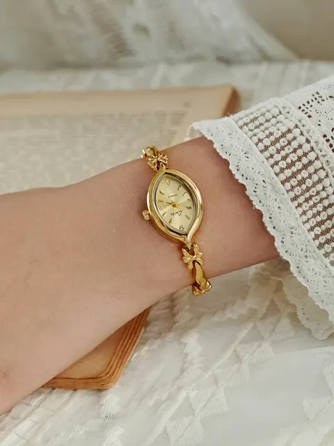 Kompakte Retro-Damenuhr mit Goldgehäuse 4