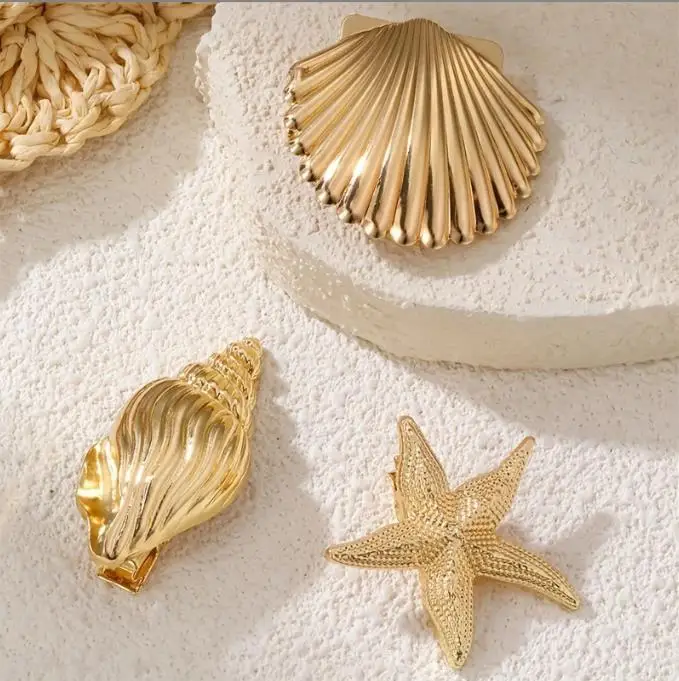 Goldene Seestern-Haarspange mit Entenschnabel