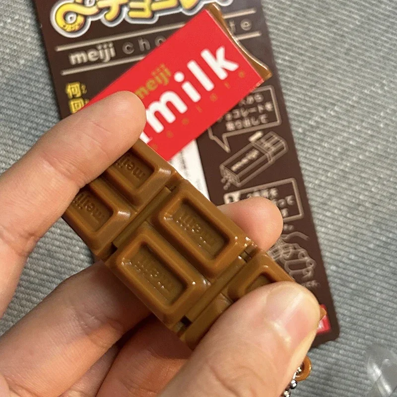 Schokoladen-Fidget-Schlüsselanhänger mit Snap-Effekt 2