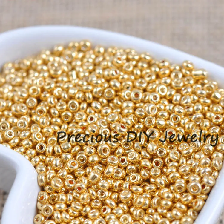 Tschechische Rocailles-Glasperlen in Gold und Silber 3