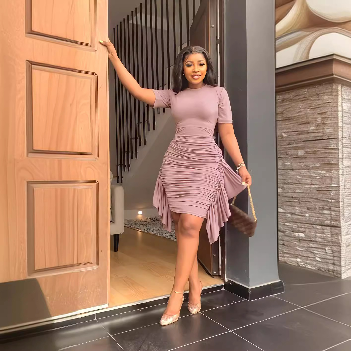 Plissiertes Kleid mit Volants