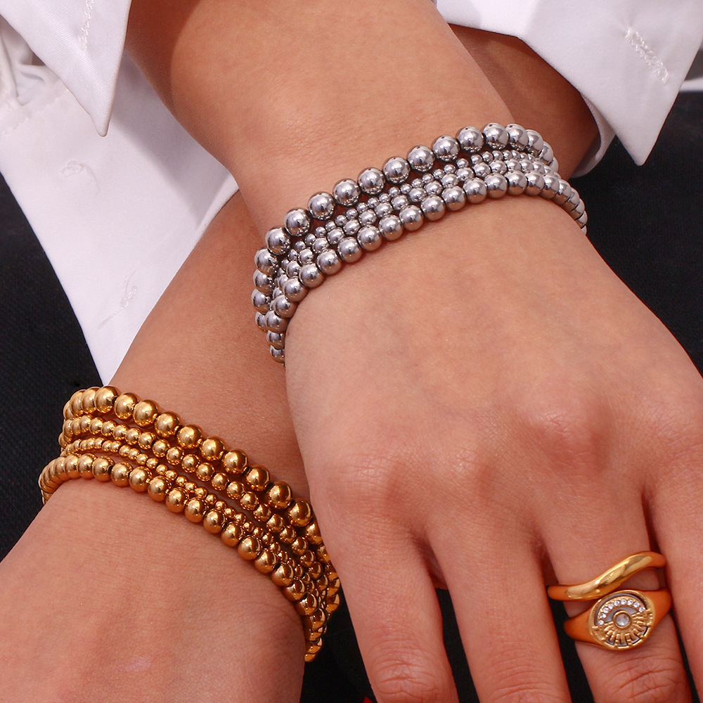 Edelstahl Perlenarmband mit 18K Gold Beschichtung