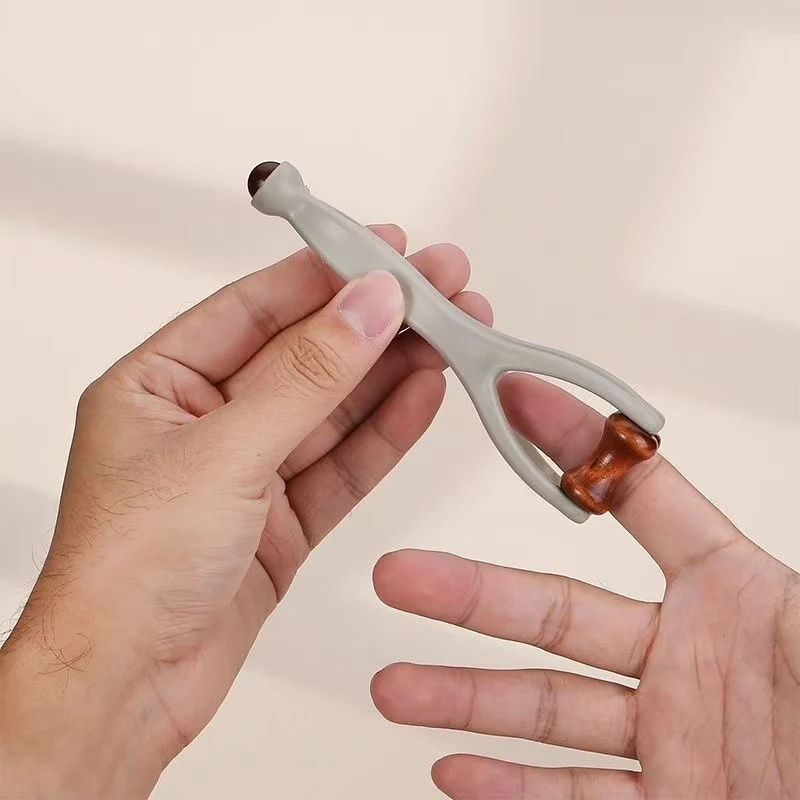 Zweireihiges Fingermassagegerät mit Rollen 4
